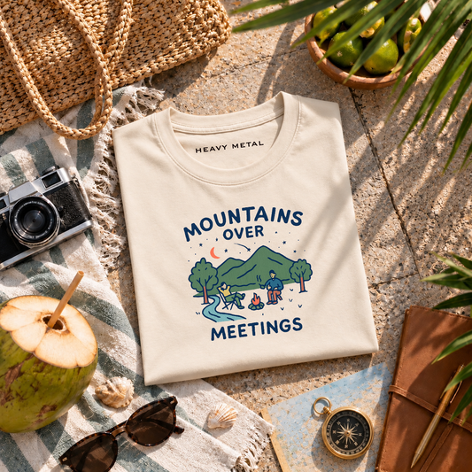 Mountains Over Meetings Travel Chiller T-shirt flat lay