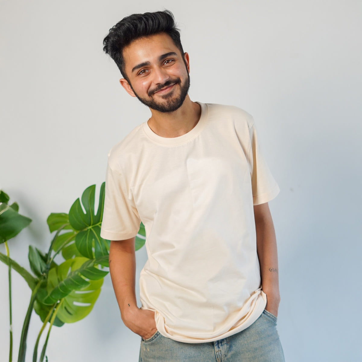 Moonlight Cream solid tee — men model