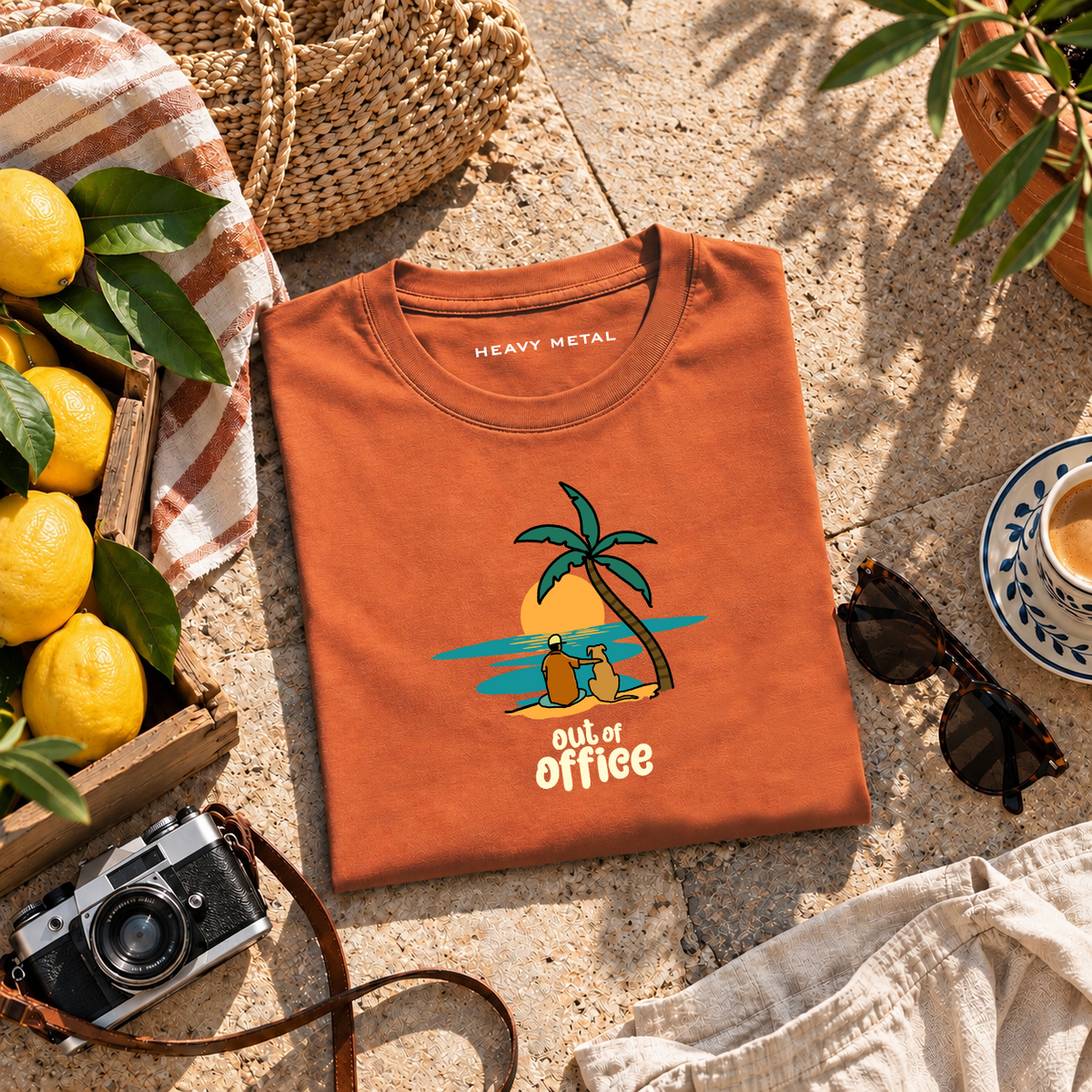 Out of Office orange tee flat lay
